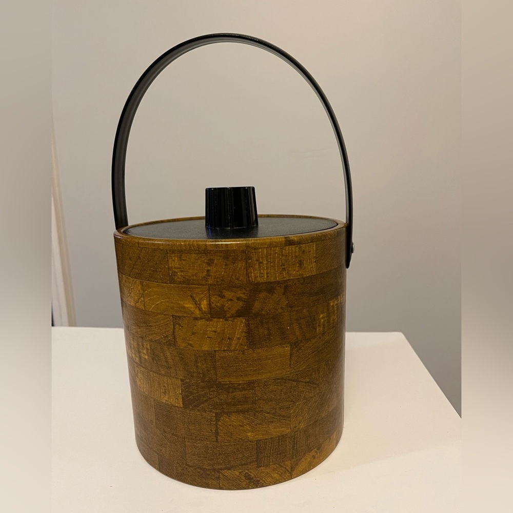 Vintage Irvinware Ice bucket 
Faux wood wrapped plastic ice bucket.